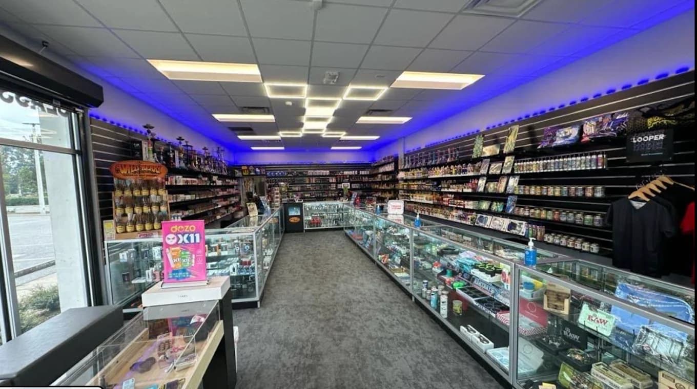 Glass cases running the length of the shop floor at Smoke Shop Kart.